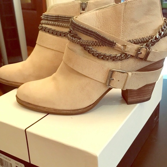 Edgy, multi-chain Dolce Vita booties - Picture 1 of 4
